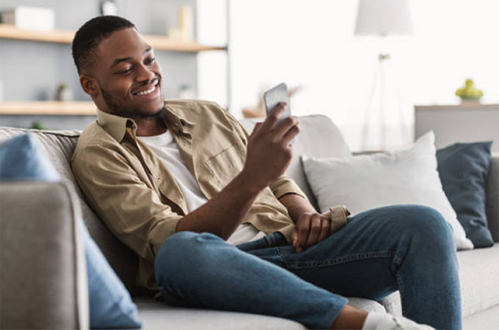 Man with phone sitting